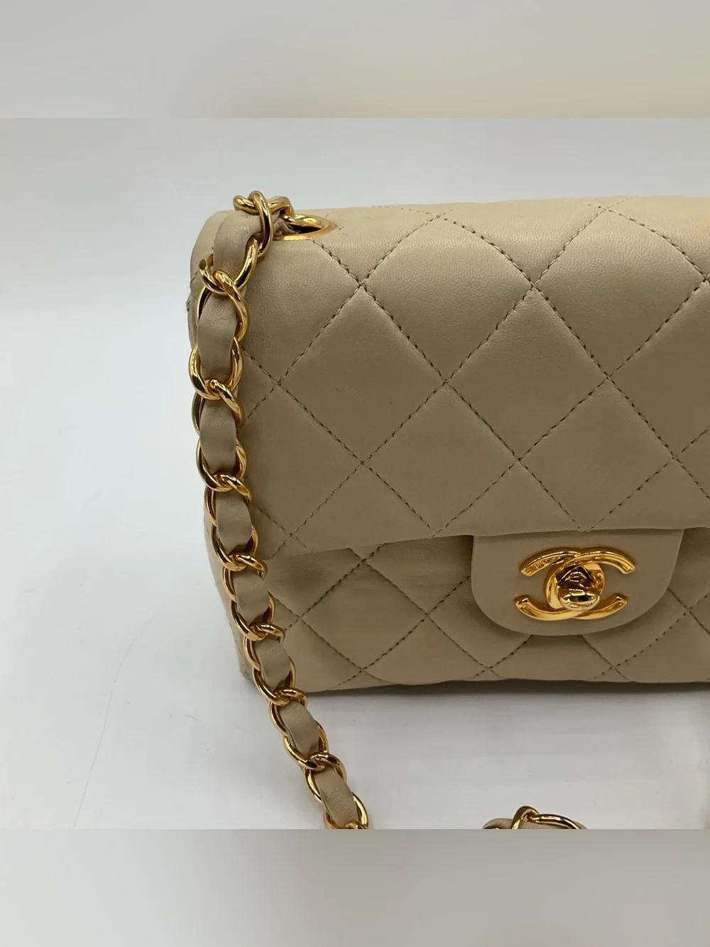 Chanel Classic Mini Flap Beige Quilted Lambskin Leather Gold Chain Shoulder Bag
